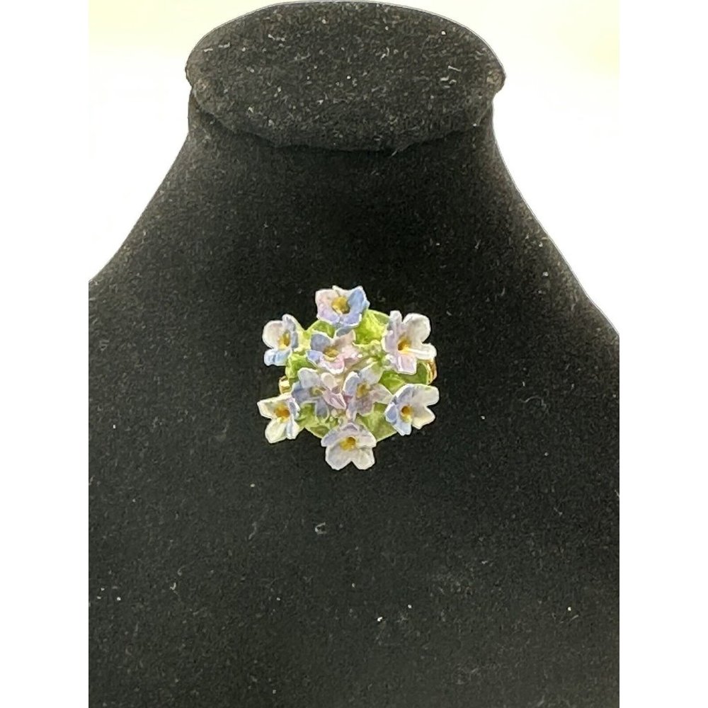 Vintage flowered brooch with purple blue flowers on green stems made in England